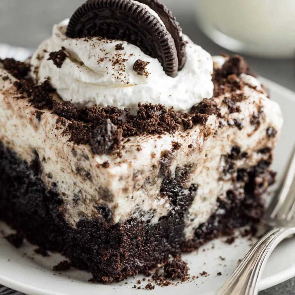 Creamy Oreo Poke Cake