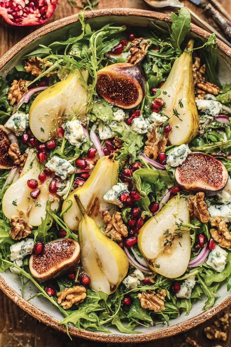 Pear and fig salad with walnuts and pomegranate