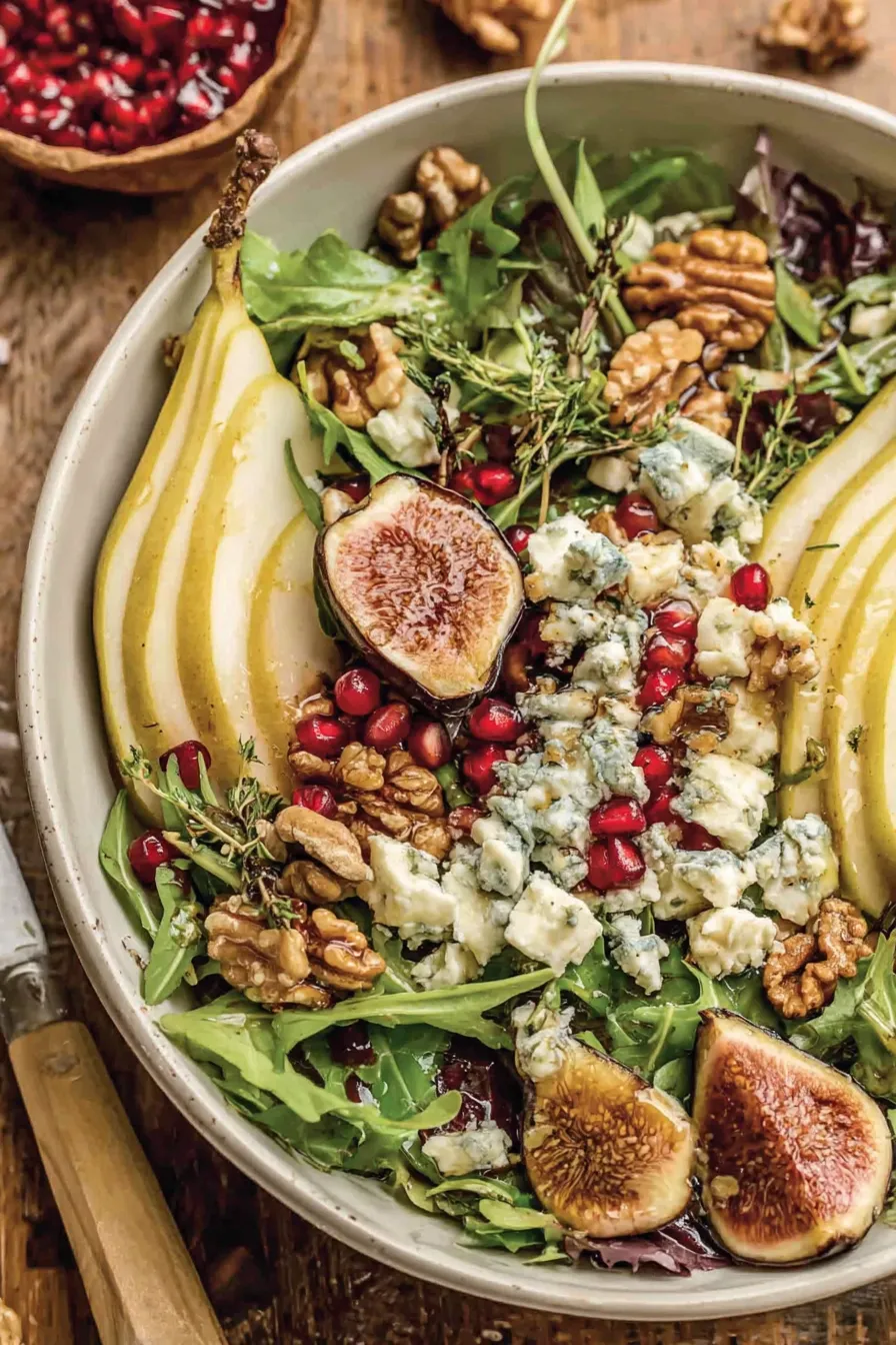 Close-up of pear salad with blue cheese and walnuts