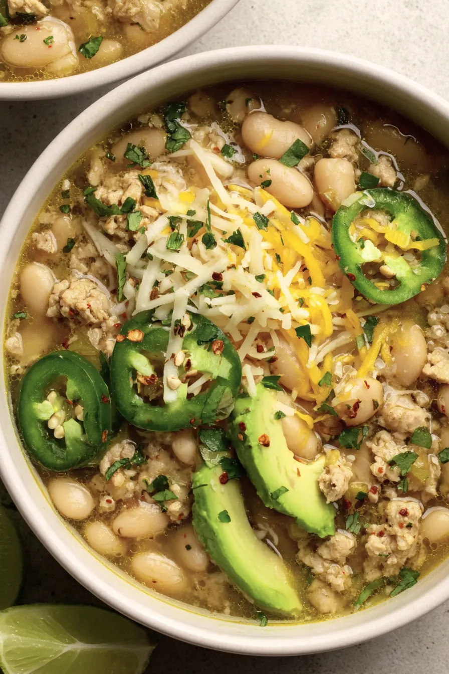 Spices and ingredients for white turkey chili on a counter