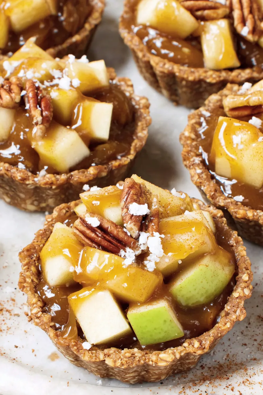 No bake caramel apple tartlets on a serving board