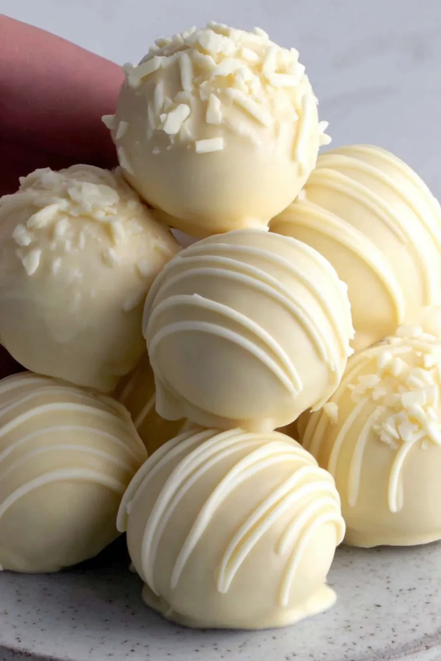 Close-up of truffle being dipped