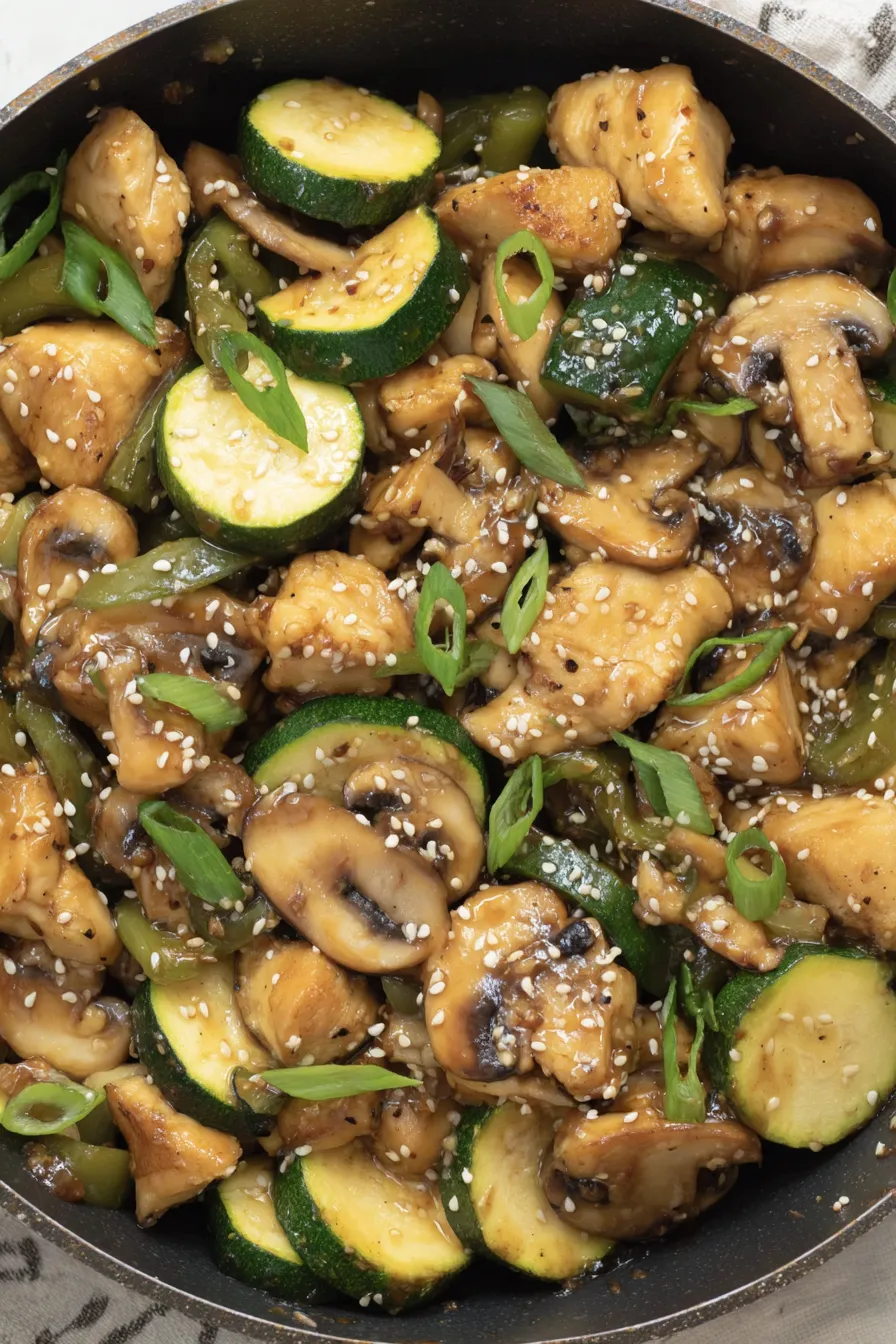 Panda Express style mushroom chicken in a skillet