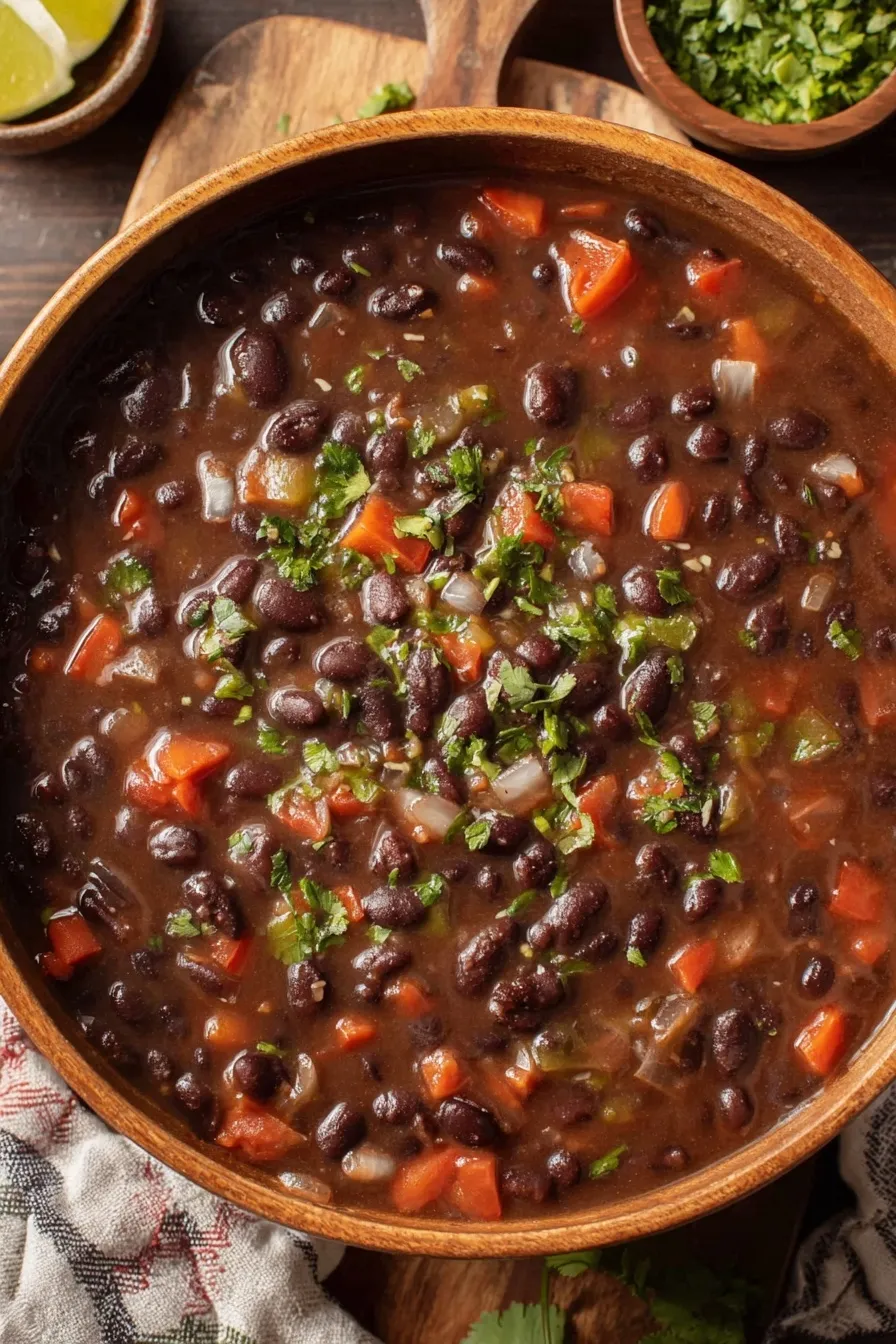 Top view of spicy black bean soup with cilantro