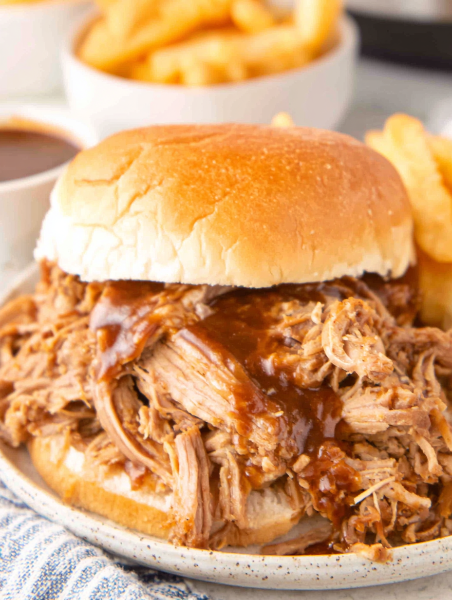 Plated pulled pork sandwich with slaw
