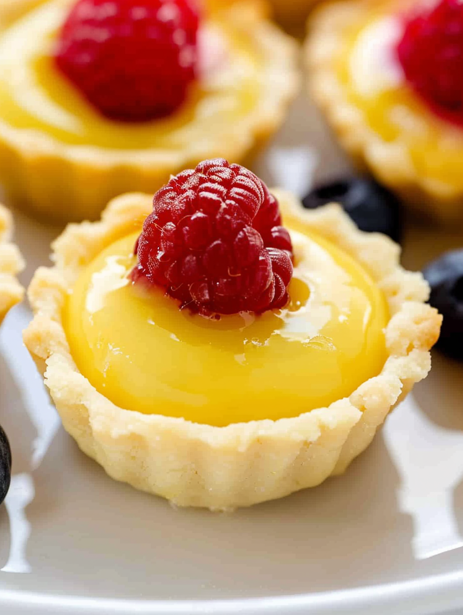 Cookie dough balls pressed into mini muffin pan