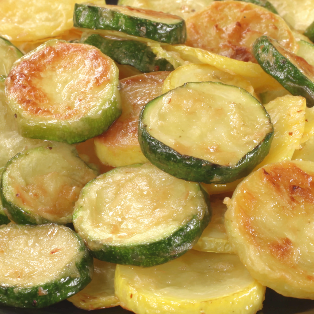 Air-fried vegetable medley with zucchini and squash on a serving board