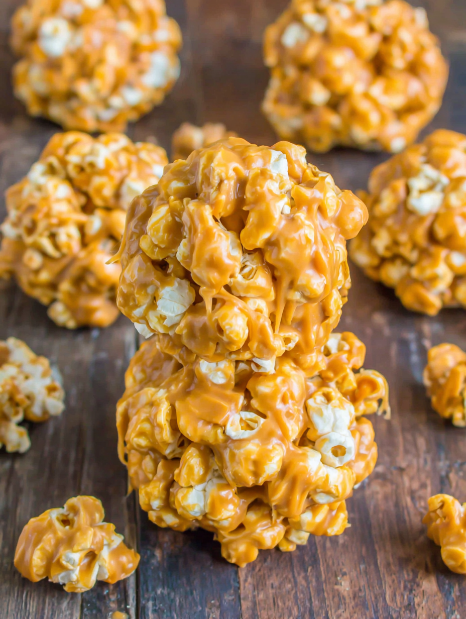 Peanut Butter Butterscotch Popcorn Balls on wax paper