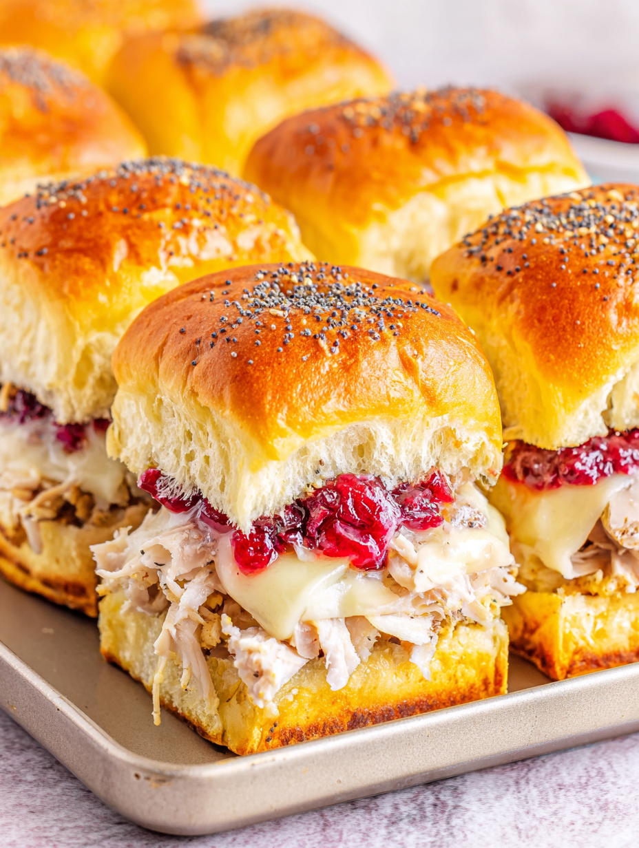 Baked turkey and cheese sliders golden on top