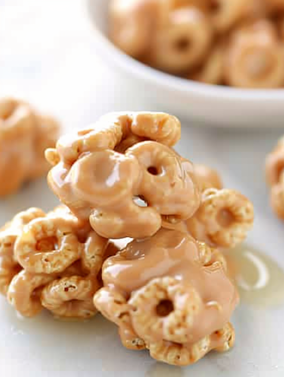 Peanut Butter Cereal Bites being portioned on parchment