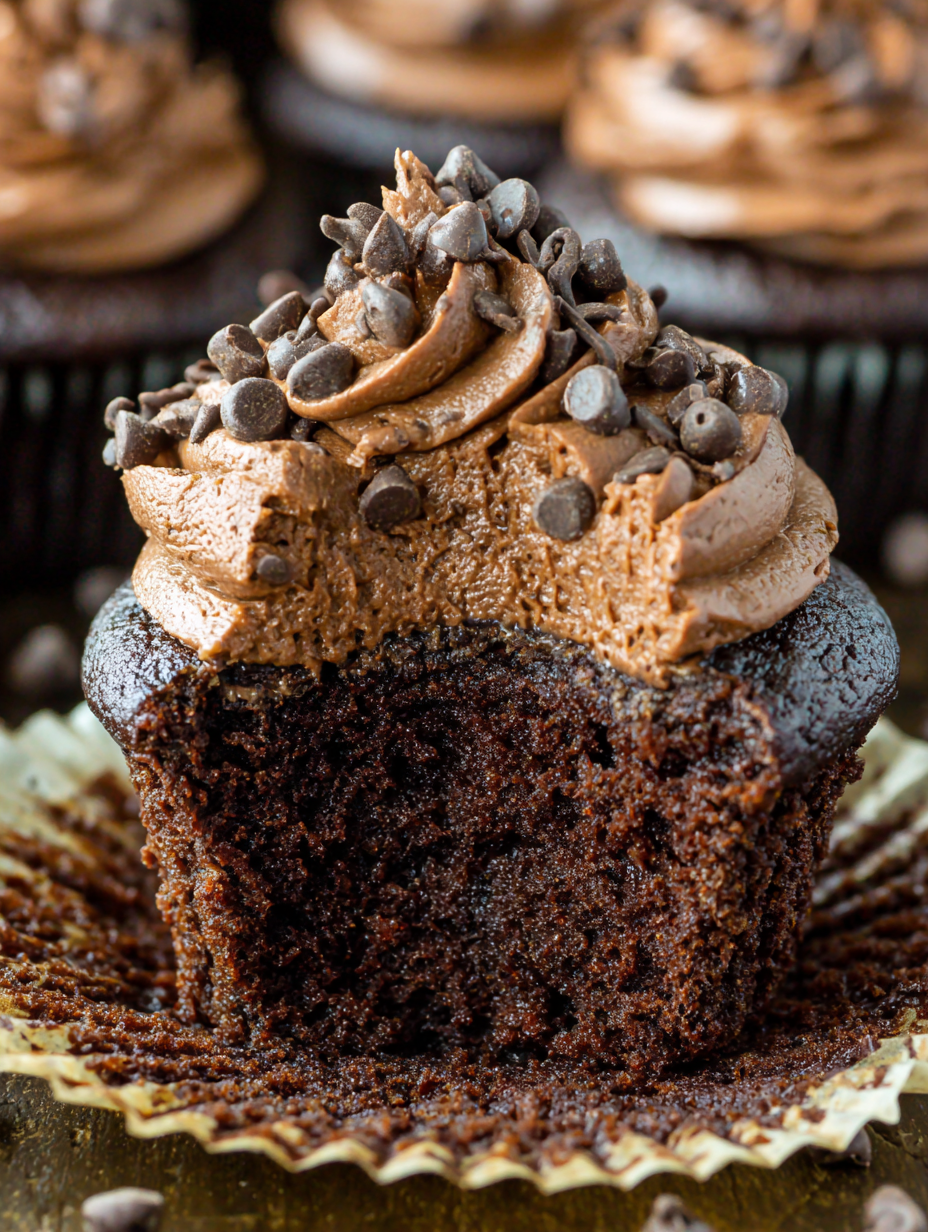 Chocolate cupcakes cooling on rack
