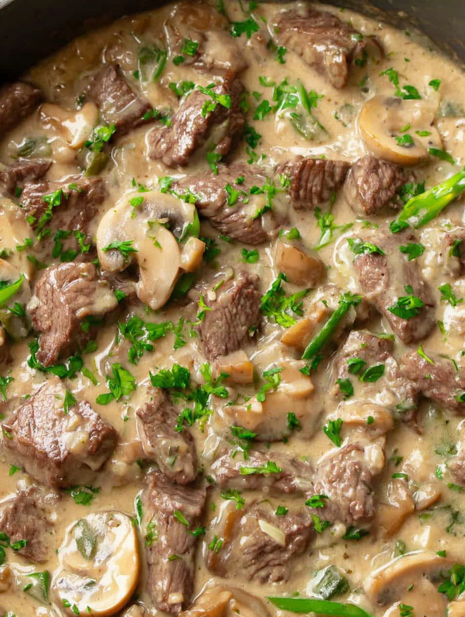 Seared beef and mushrooms in a pan