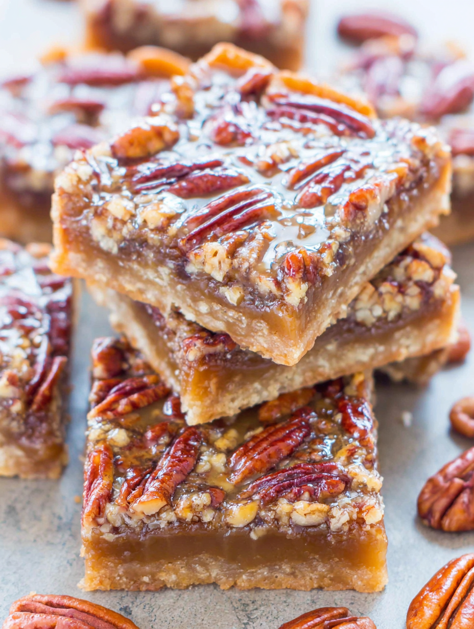 Salted caramel maple pecan pie bars on a cooling rack