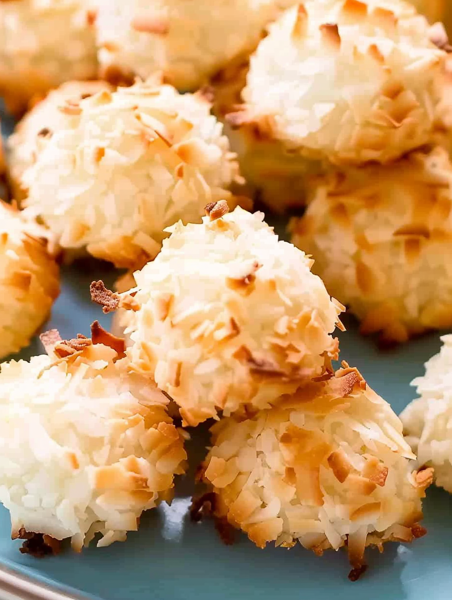 Freshly baked coconut macaroons on baking sheet