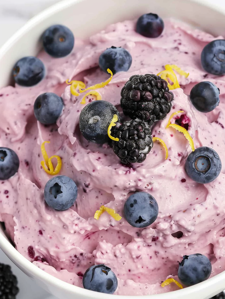 Blueberry Fluff in serving bowl with lemon zest