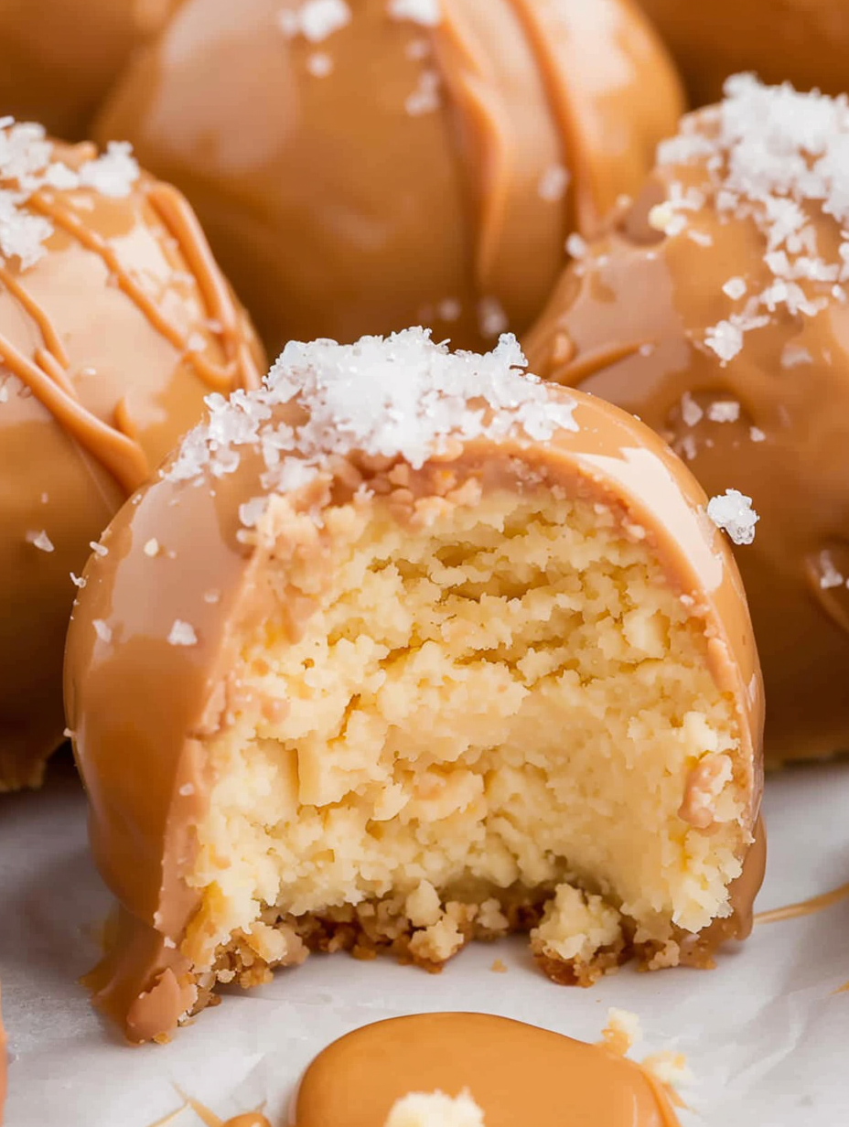 Caramel coated cheesecake bites on parchment