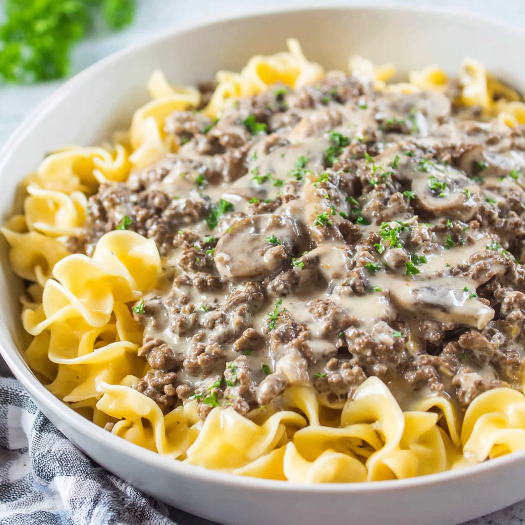 Skillet of ground beef stroganoff with creamy gravy