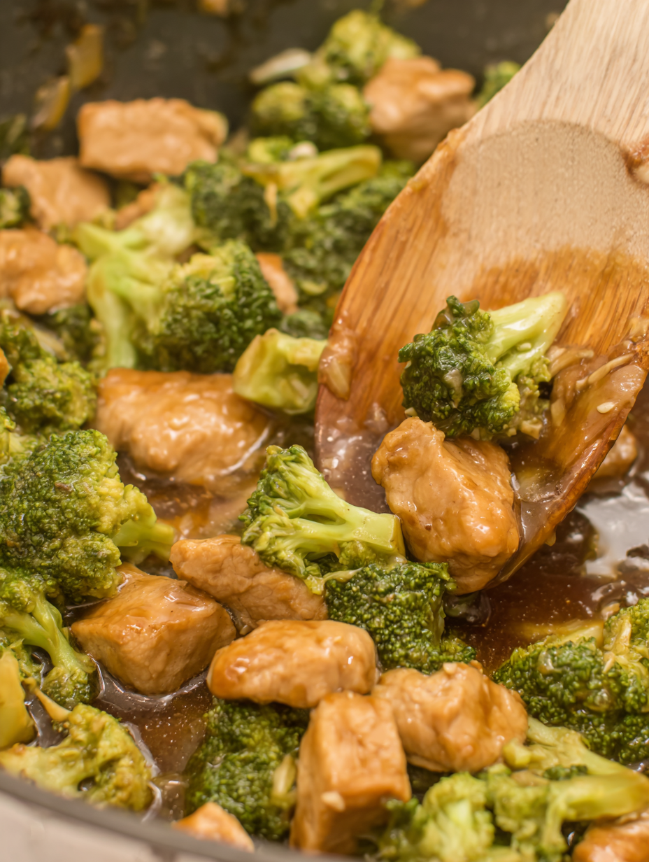 Teriyaki pork and broccoli in a skillet