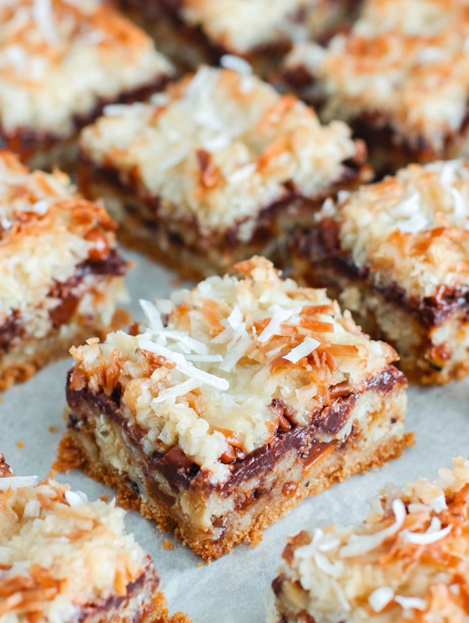 7-layer bars in pan with golden coconut top