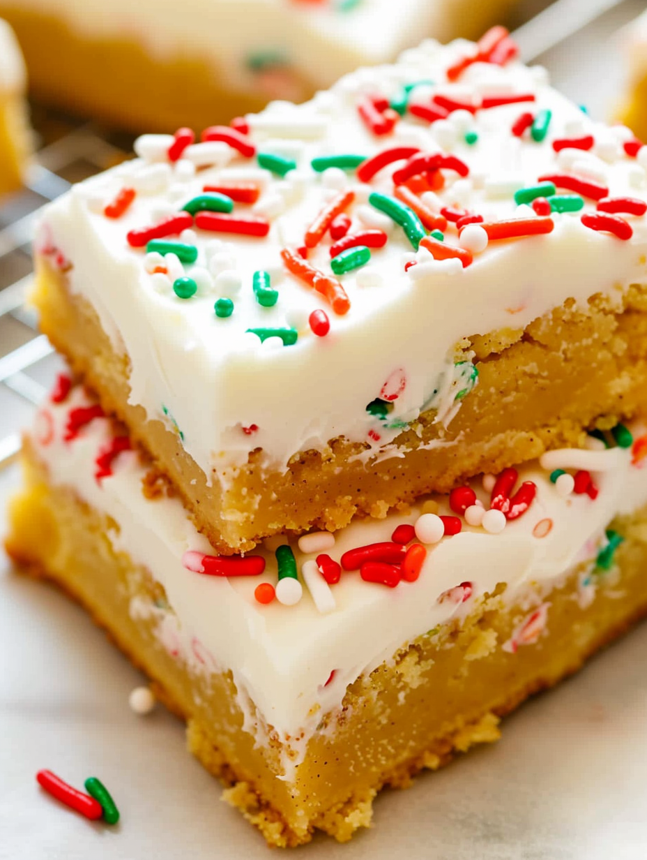 Frosted Snickerdoodle bars with holiday sprinkles