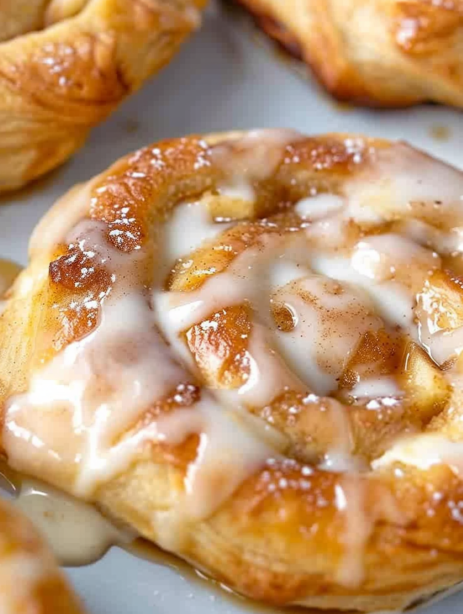 Closeup of glazed apple danish