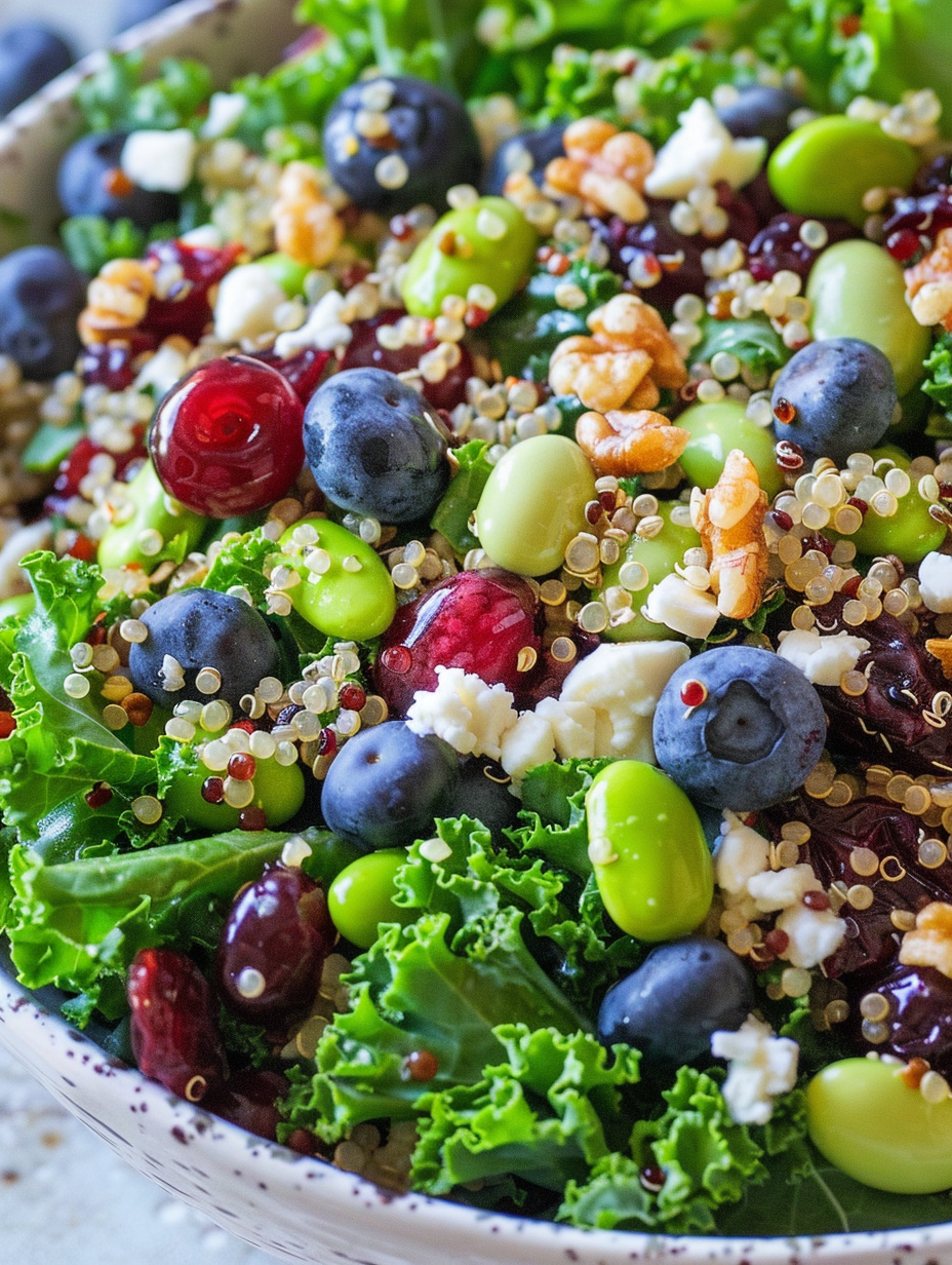 Close-up of kale, quinoa and berries in a bowl
