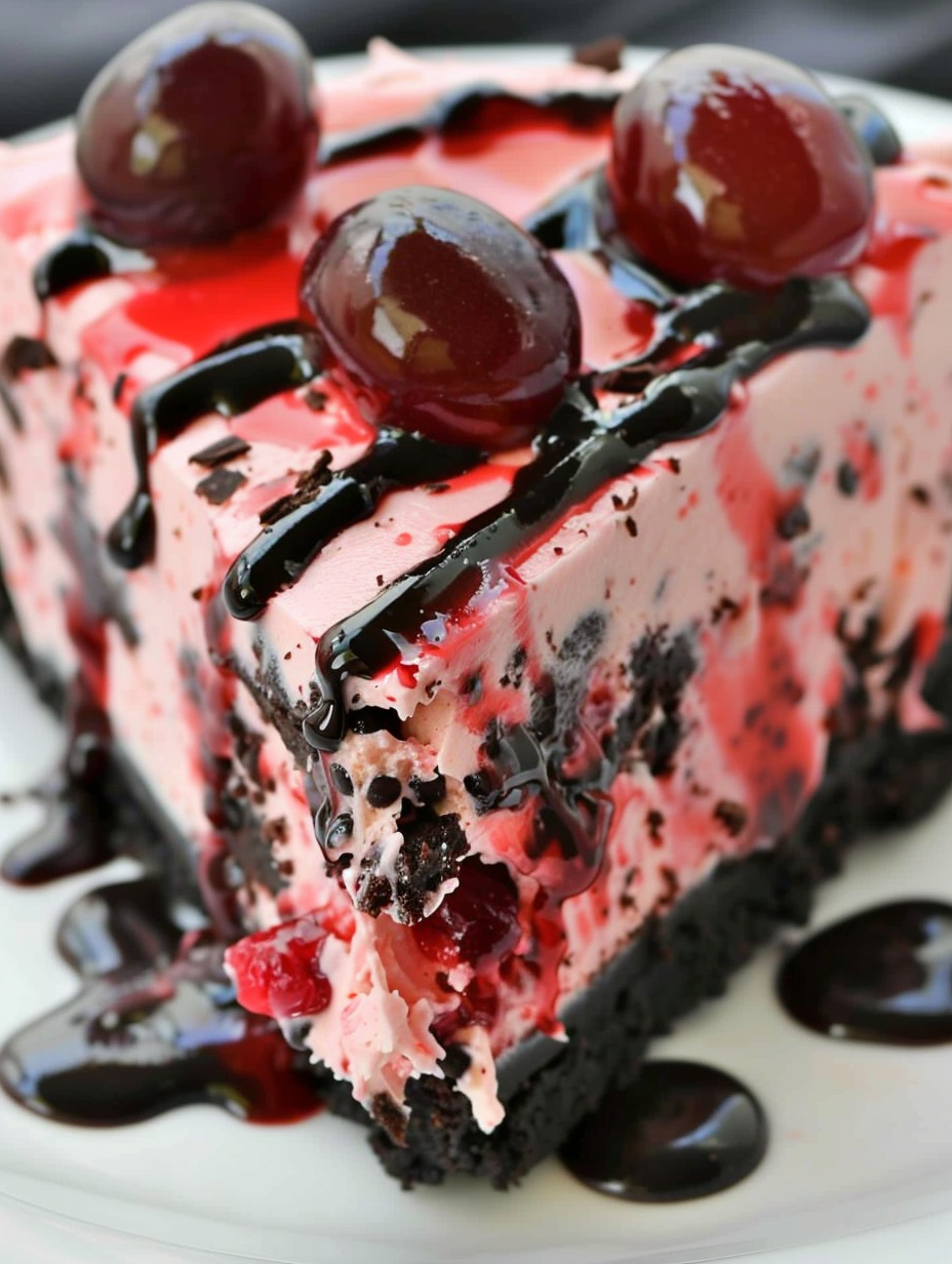 Oreo Cherry Chocolate Chip cheesecake on a cooling rack