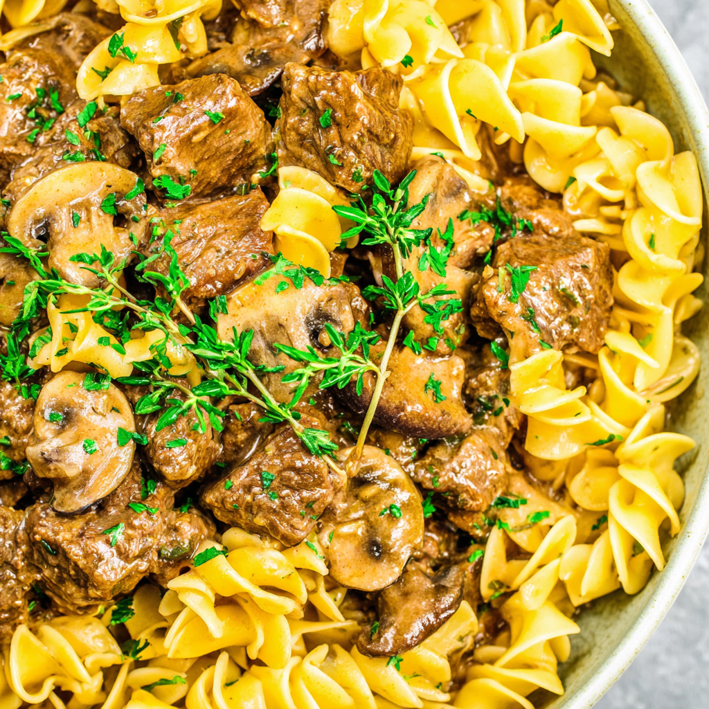 Bowl of stroganoff with parsley garnish