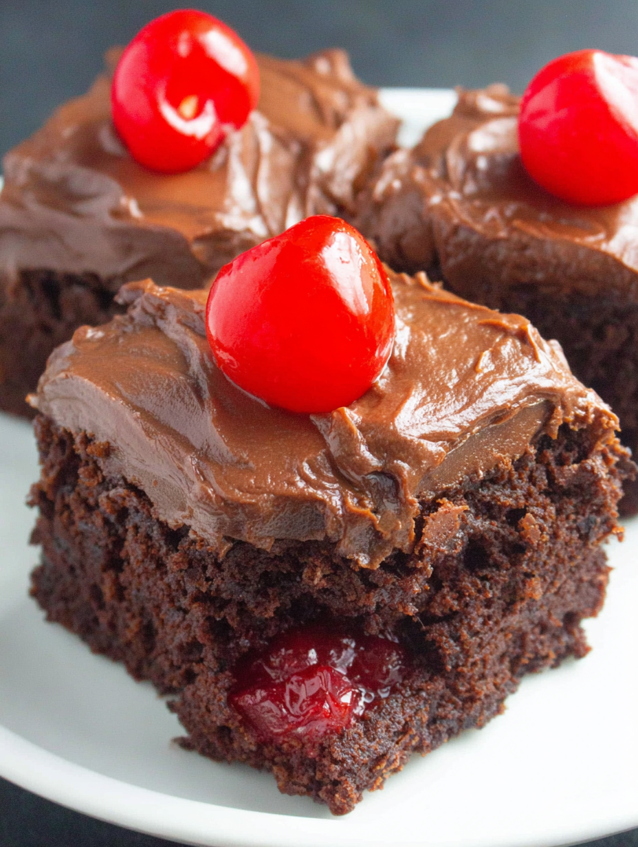 Chocolate cherry bars in a 13x9 pan with glossy frosting