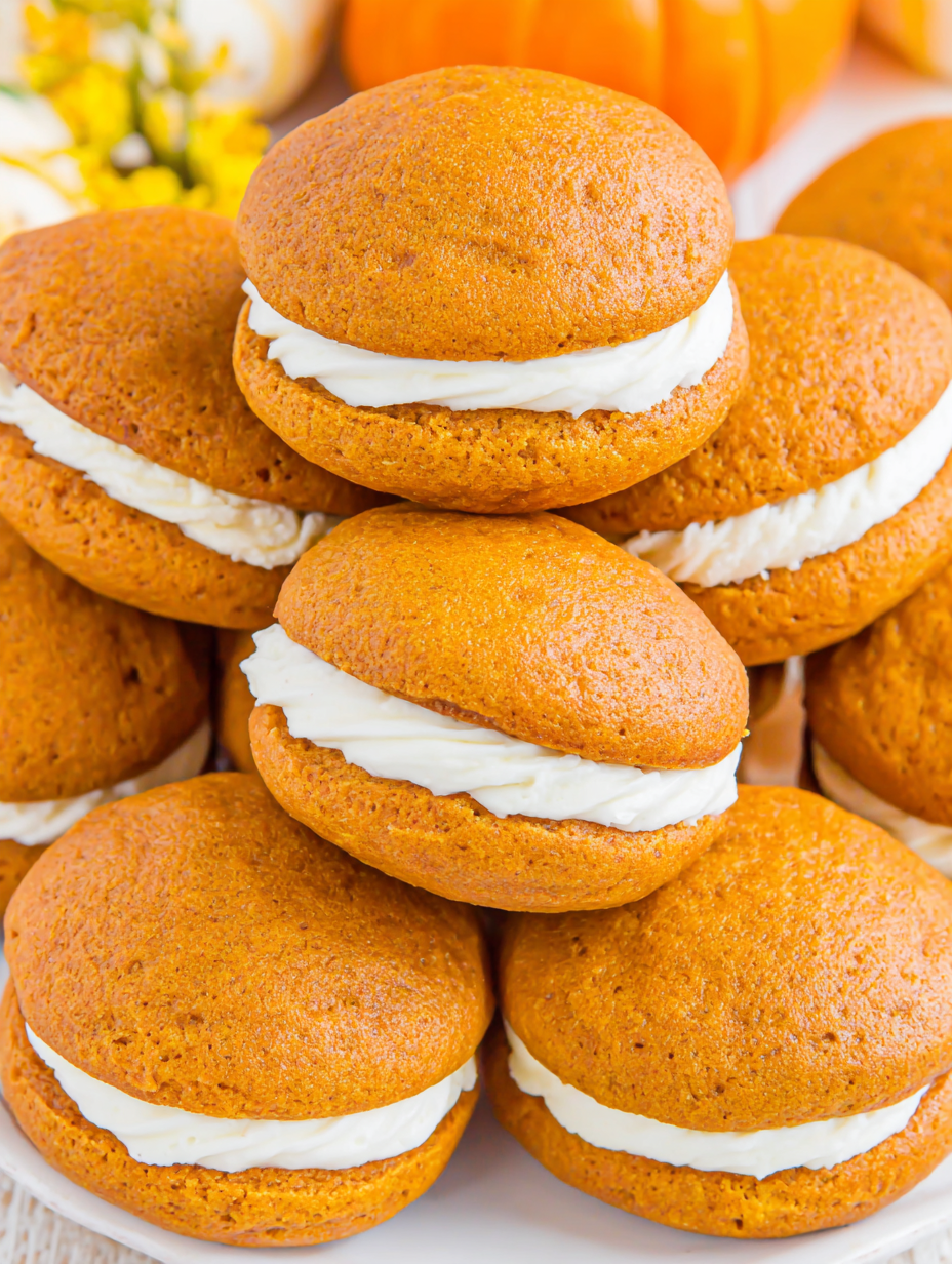 Pumpkin whoopie pies on a cooling rack