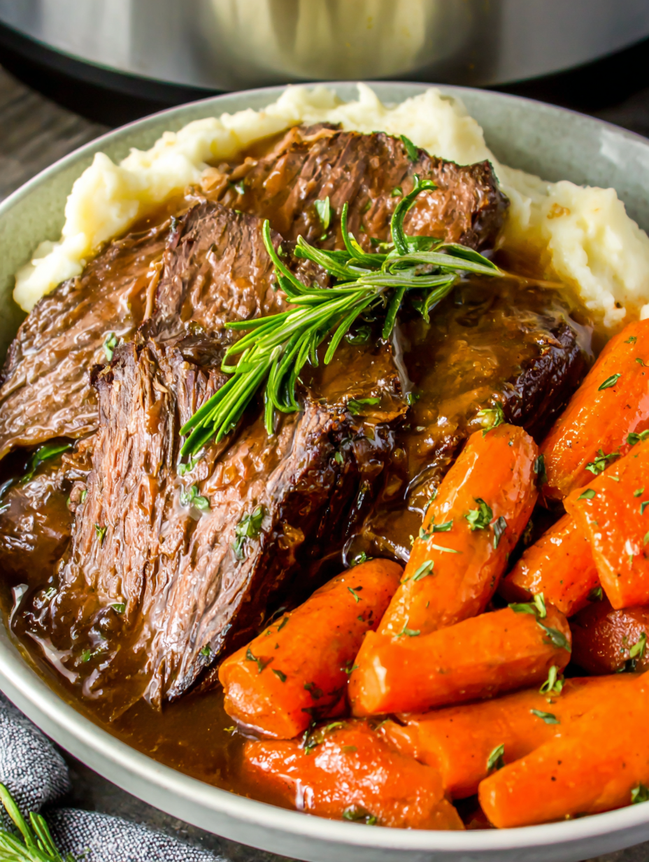 Platter of shredded pot roast with carrots