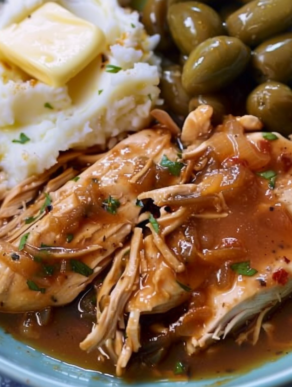 Shredded Mississippi chicken served with rolls