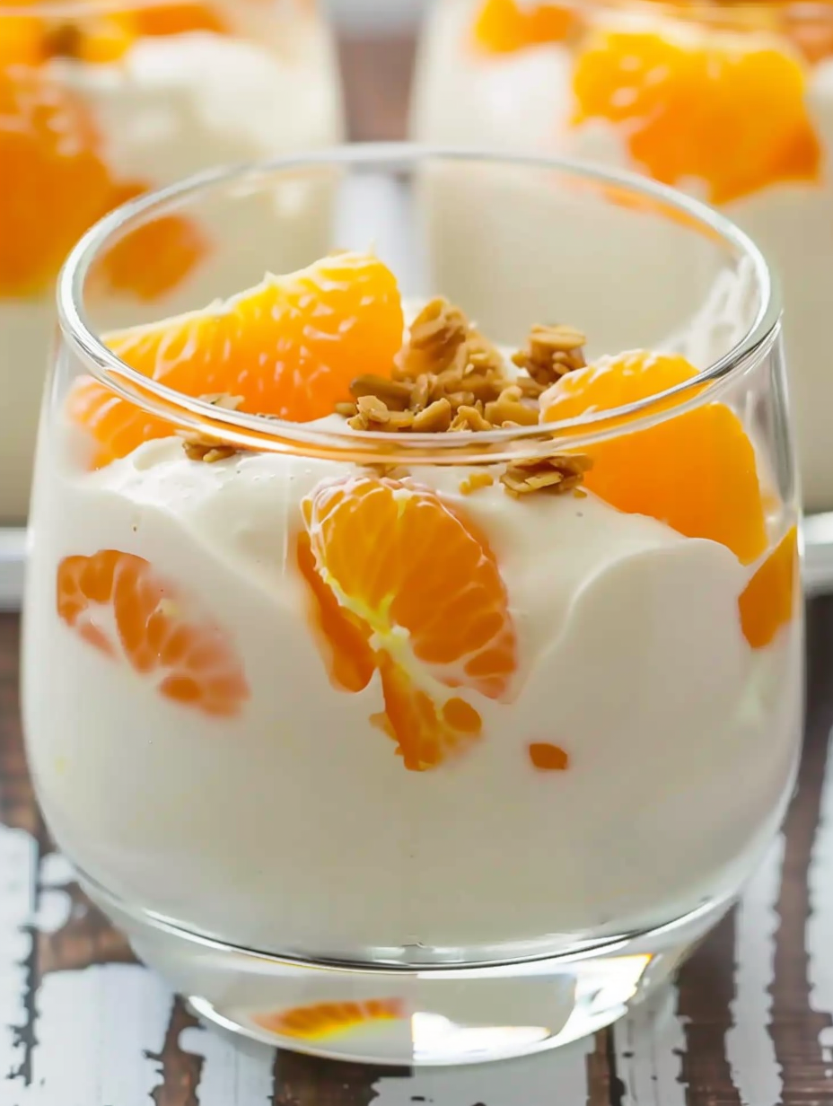 Close-up of orange cream with granola