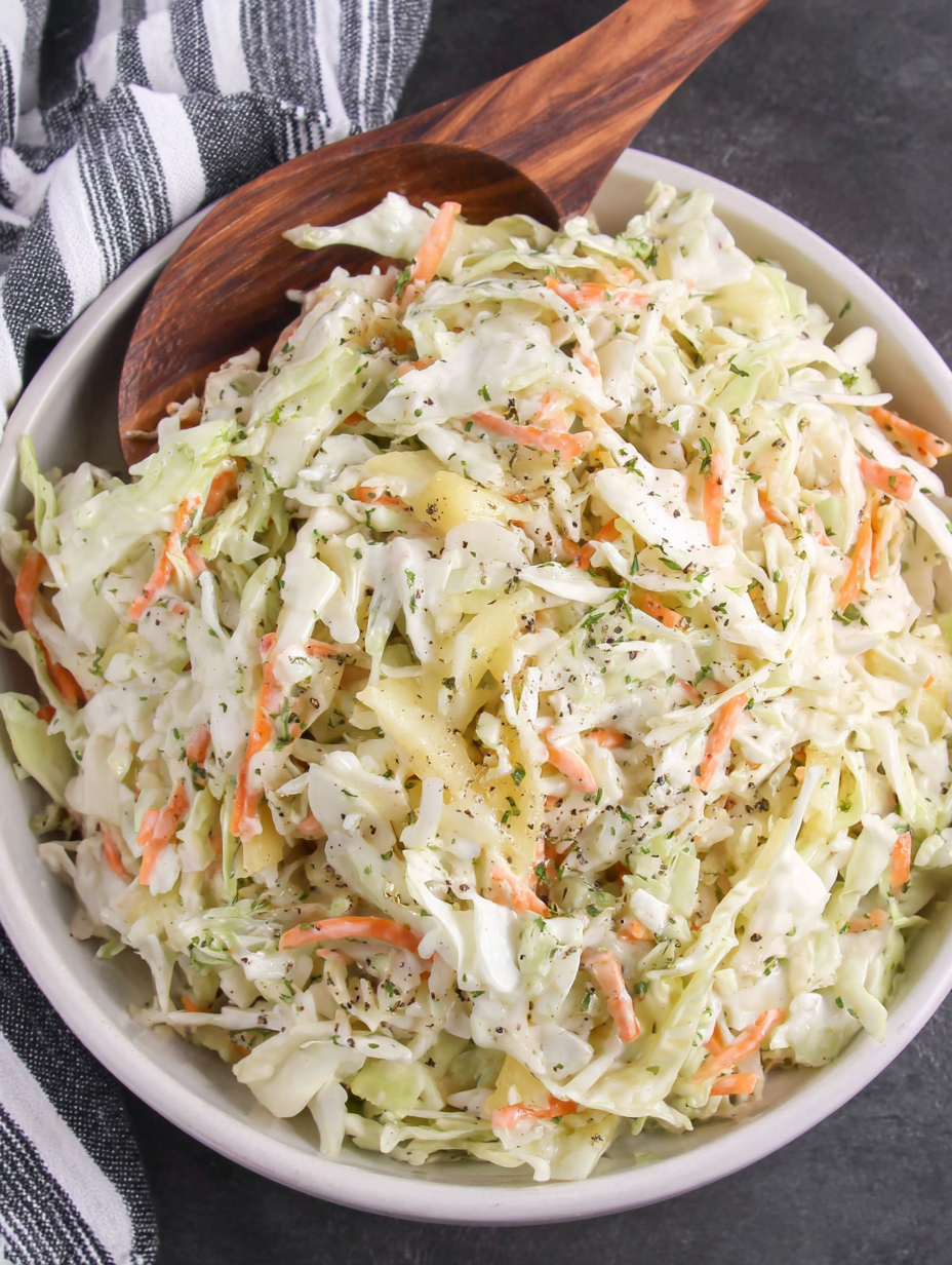 Hawaiian coleslaw bowl with crushed pineapple and cilantro