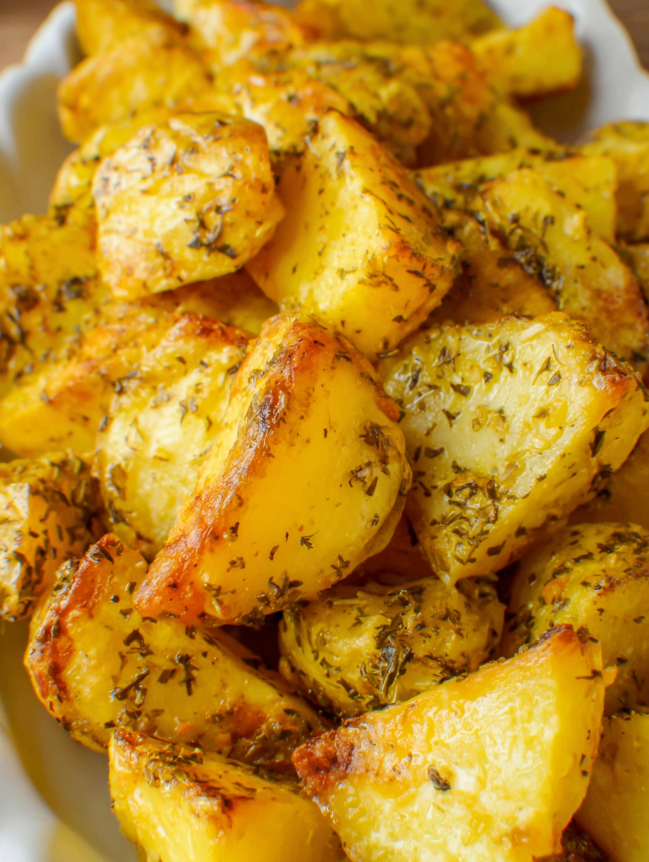 Lemony Greek potatoes in a baking dish