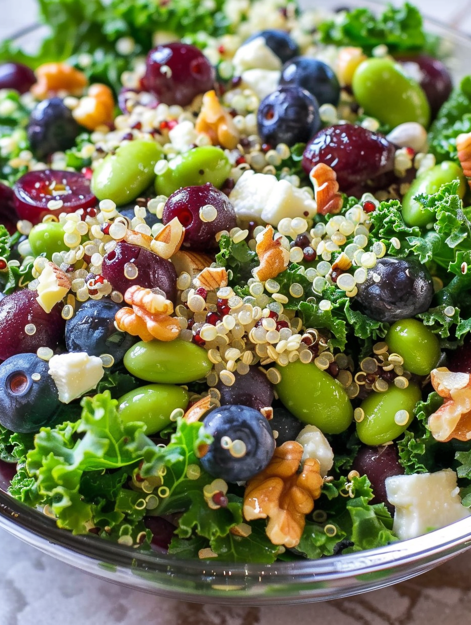 Tossing the superfood salad in a large bowl