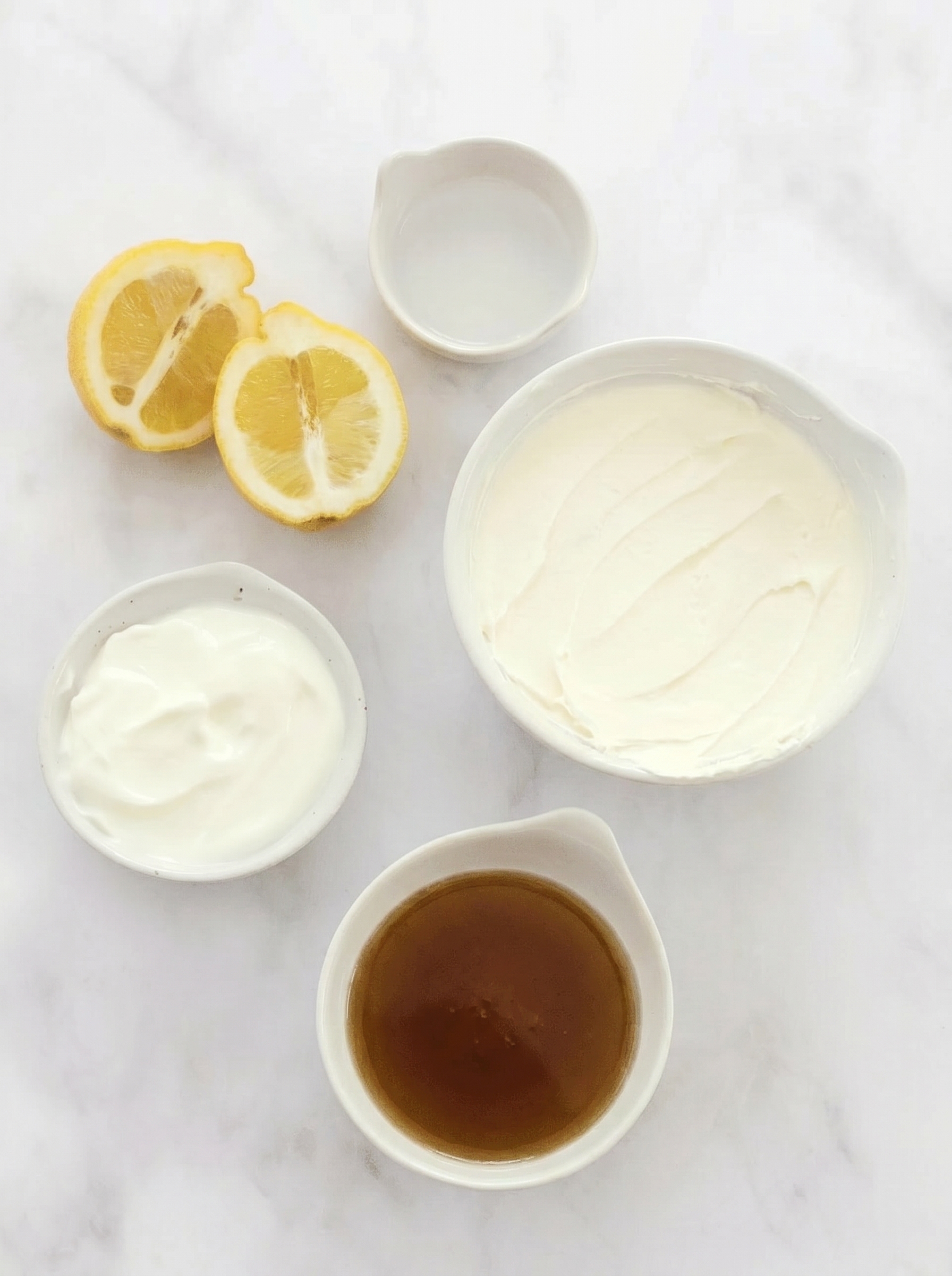 Cream cheese frosting being whipped in a bowl