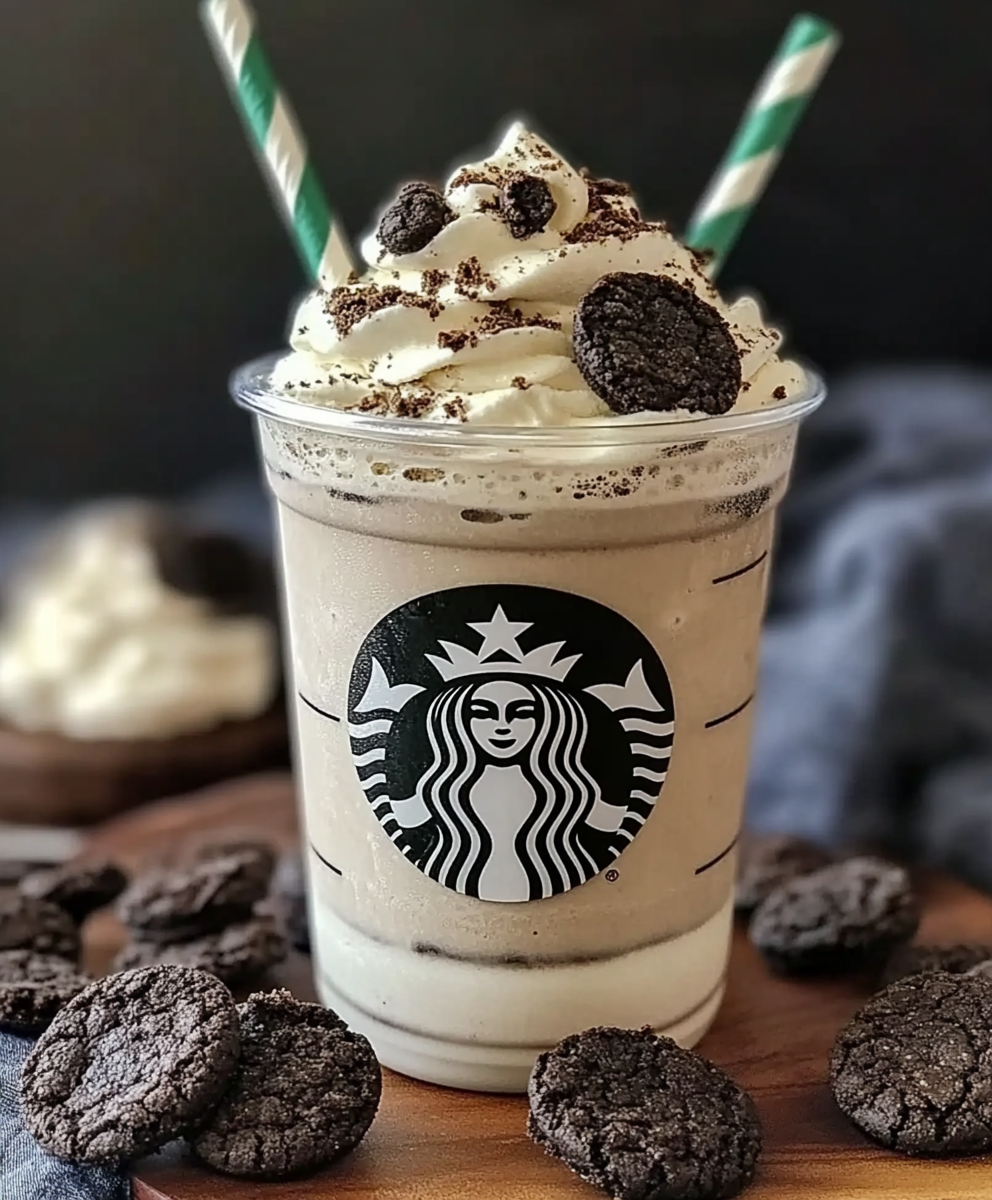 Whipped cream and cookie crumbles topping the frappuccino