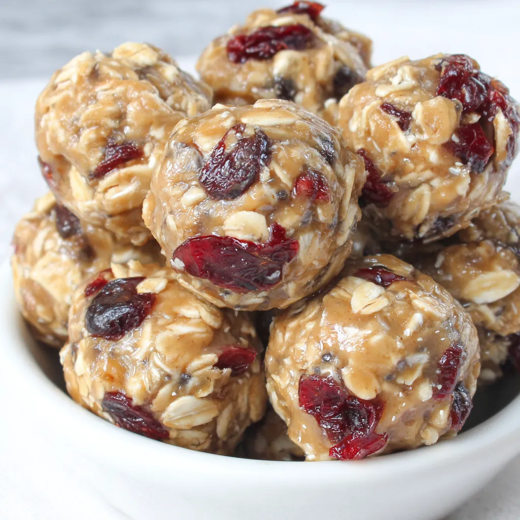 Close-up of energy bite showing oats and cranberries