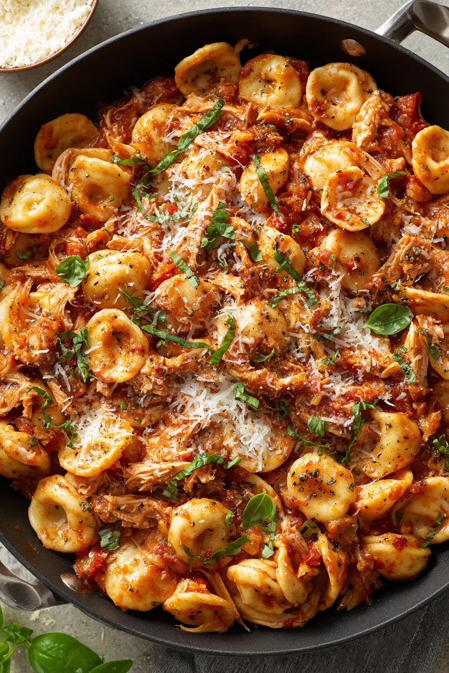 Chicken Fra Diavolo in a pot with herbs