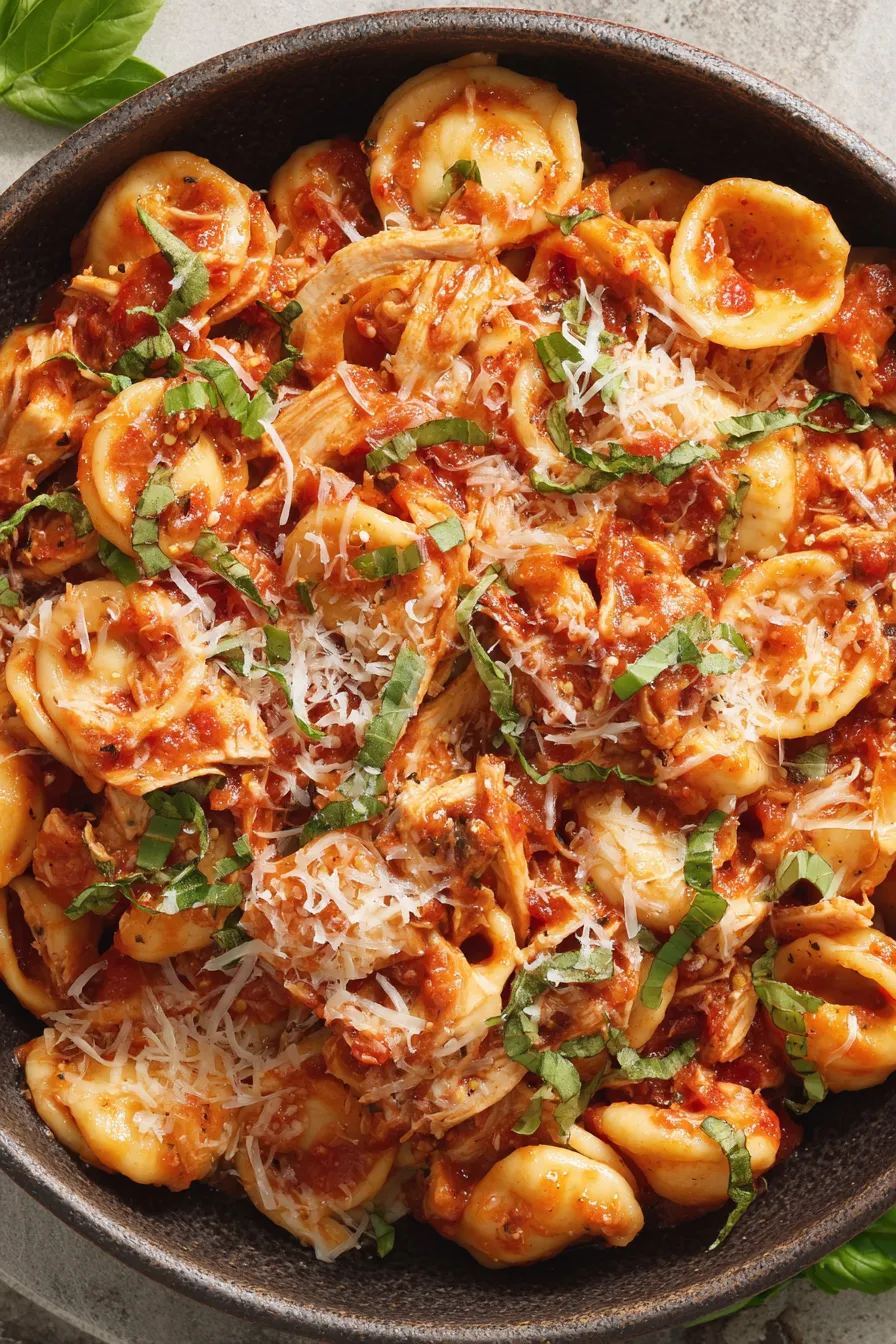 Served Chicken Fra Diavolo with basil and parmesan