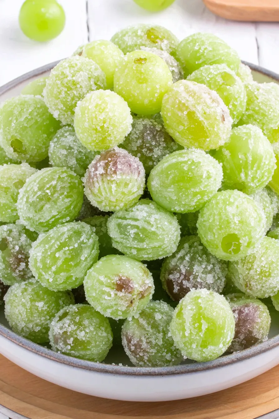 champagne sugar grapes soaking in champagne in a bowl