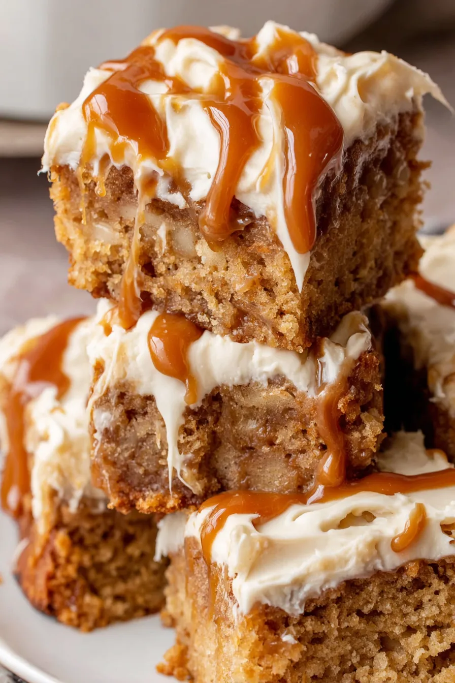 Sliced apple spice cake with caramel drizzle