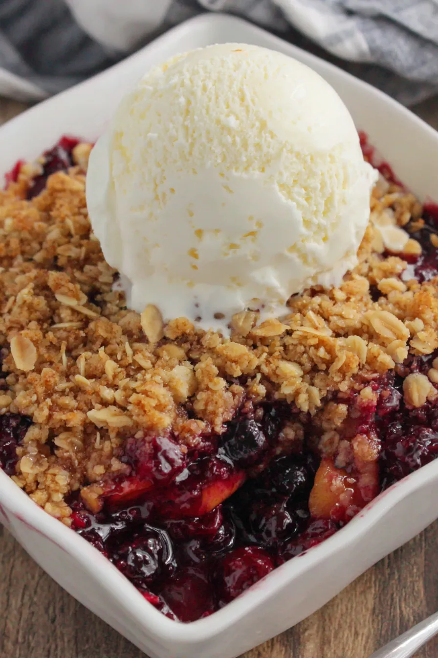 Blueberry Peach Crisp bubbling in dish