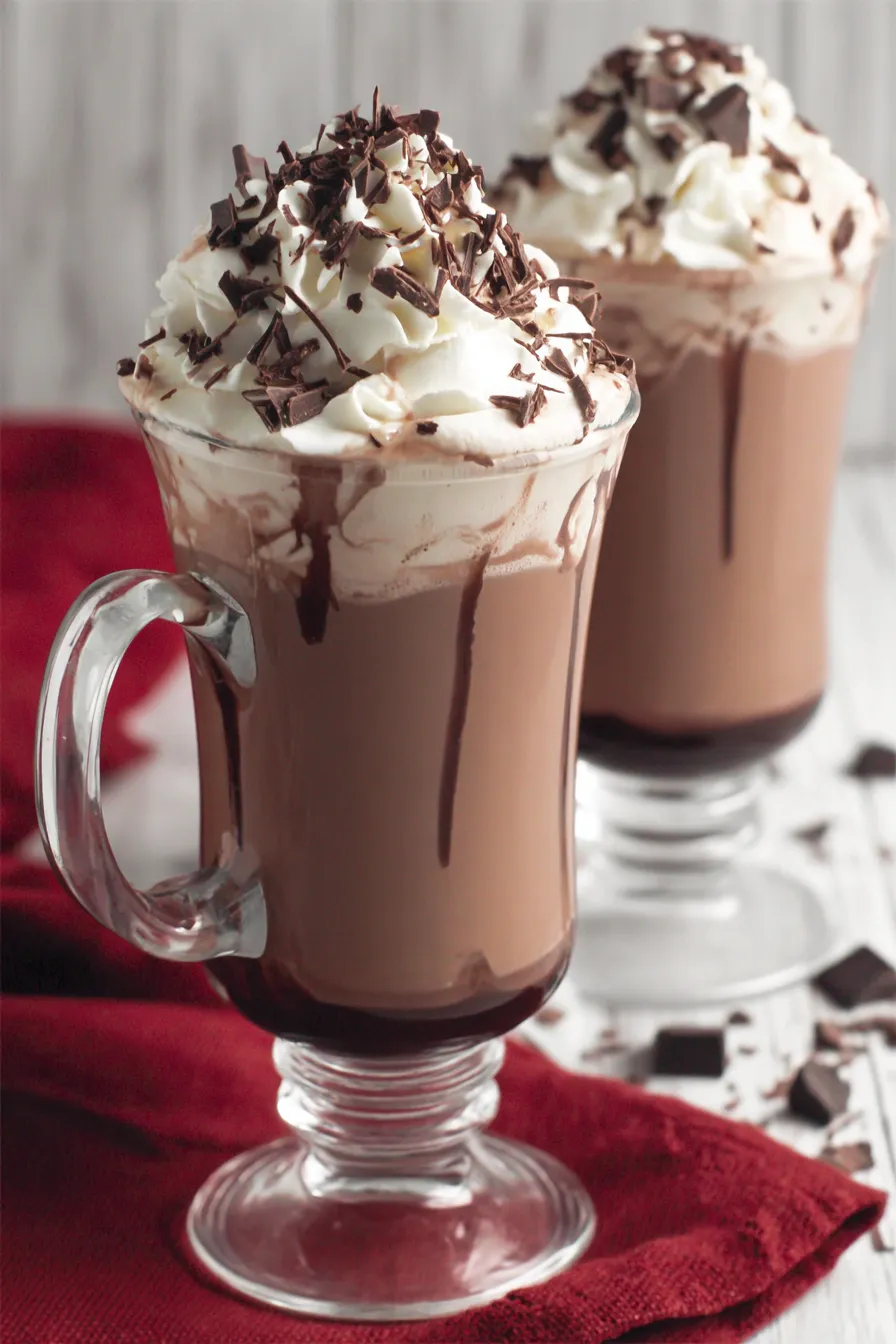 Close up of whipped cream and chocolate shavings on hot chocolate