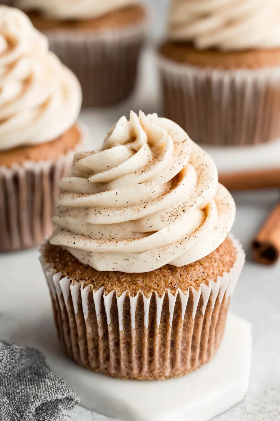 Closeup of spice-dusted pumpkin cupcake
