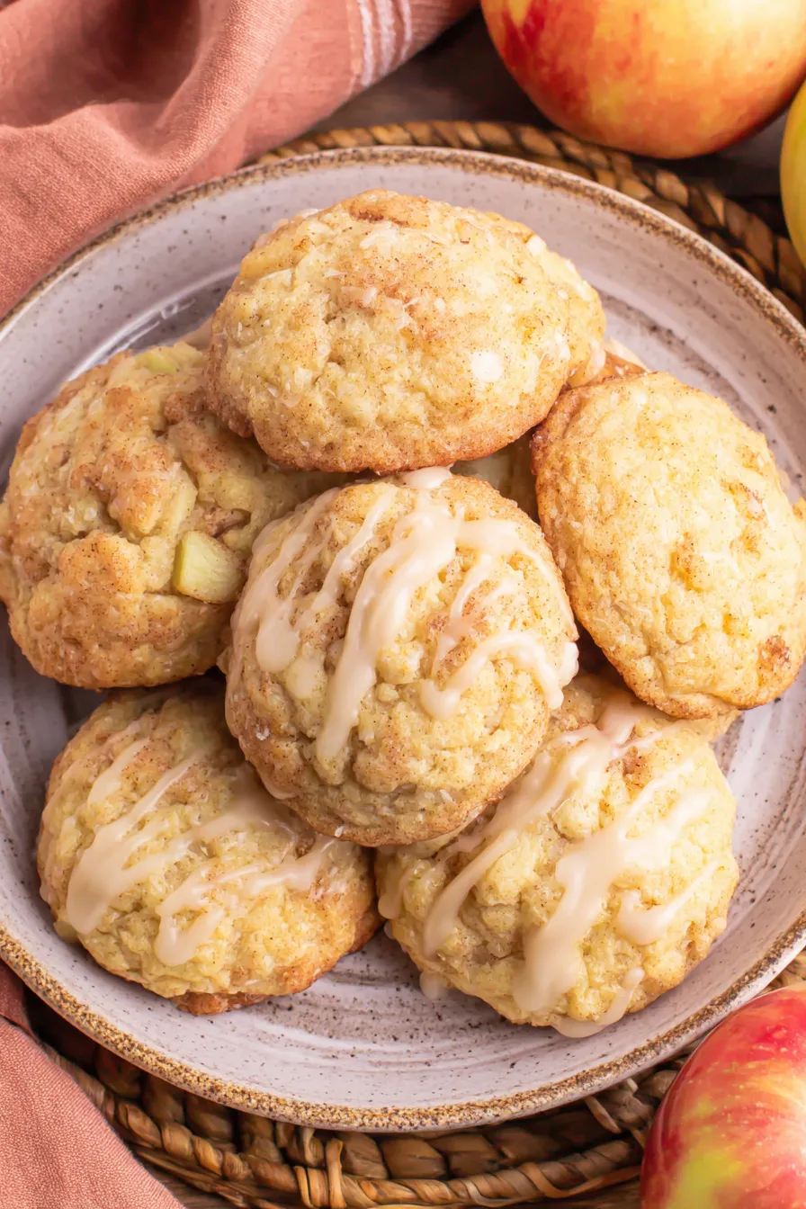 Iced apple cider cookies on parchment