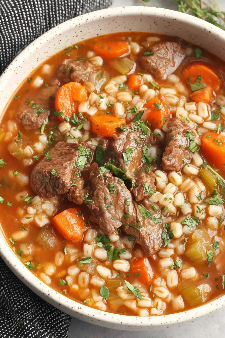 ingredients for beef barley soup on countertop
