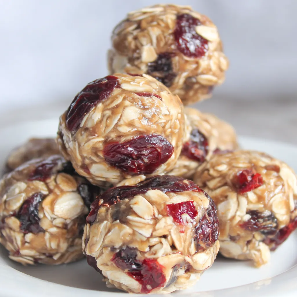 Cranberry almond energy bites on parchment