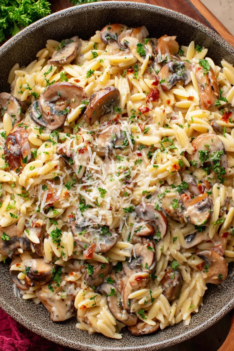 Toasted orzo in a skillet before broth added